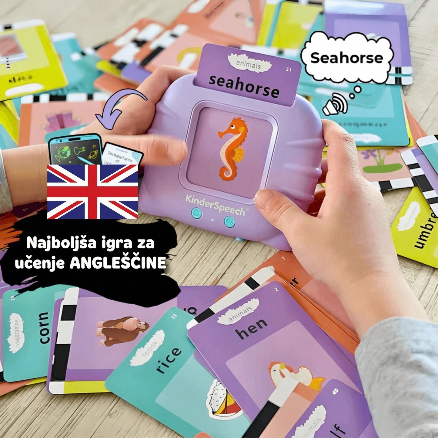 Interaktivna naprava Kinderspeech za učenje angleščine, ki s pomočjo zvočnih kartic, kot sta "seahorse" in "hen", otrokom na zabaven način pomaga pri usvajanju tujega jezika.